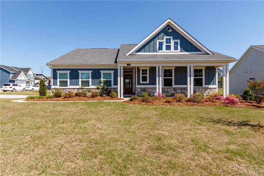 Front exterior of a new home in Sweetbay Farm, Lawrenceville, GA, highlighting curb appeal (Image 30).