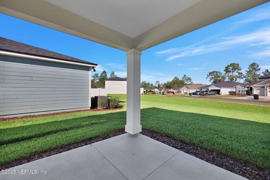 Exterior details and patio area of a home in Bradley Creek, Green Cove Springs (Image 25).