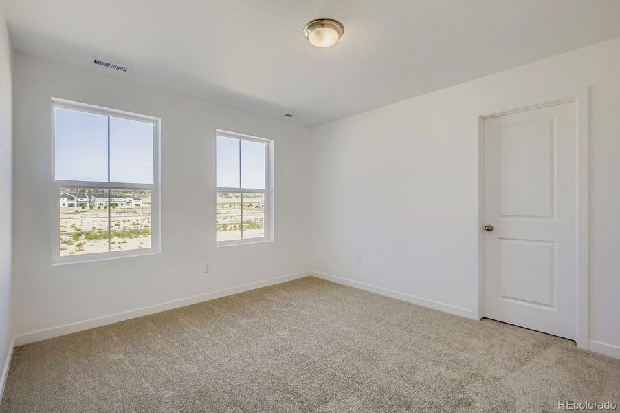 Spacious, unfurnished interior of a new home in Riano Ridge: The Pioneer Collection, Loveland (Image 8).