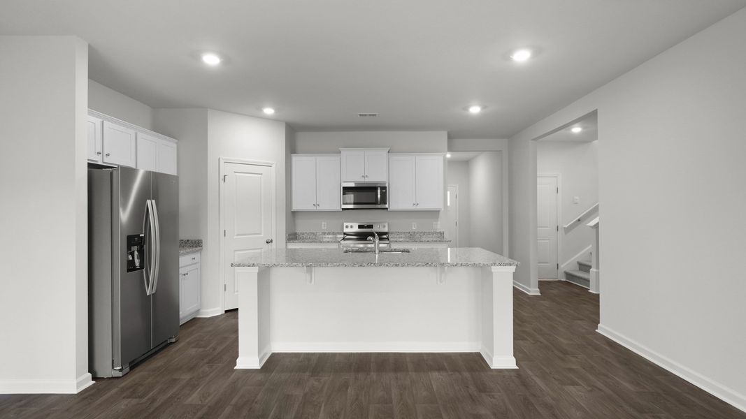 Representative furnished interior of a home built from the ARCHER-EXP by D.R. Horton in Hillcrest, Ravenel (Image 6).