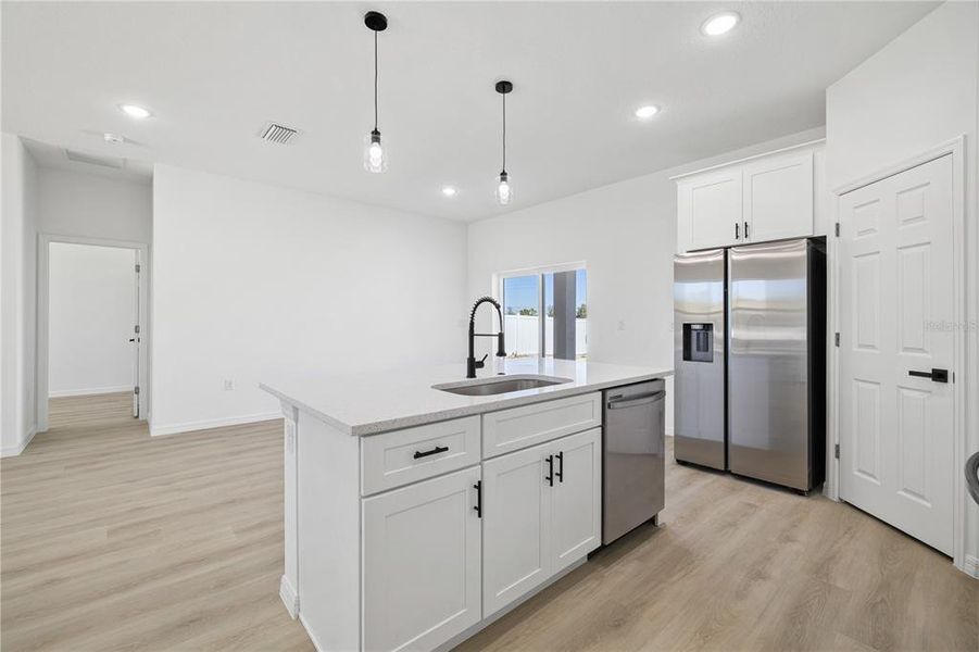 Furnished interior view inside a new home in , Poinciana (Image 6).