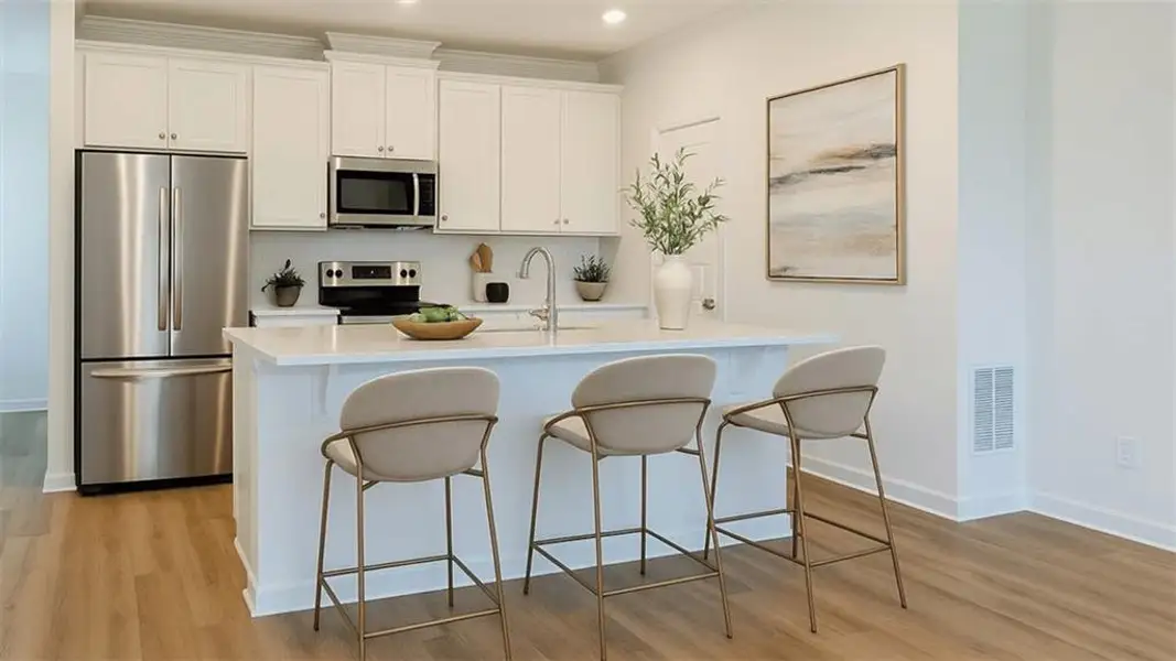 Furnished interior view inside a new home in Townes at Asbury, Hapeville (Image 1). Furnished interior view inside a new home in Townes at Asbury, Hapeville (Image 1).