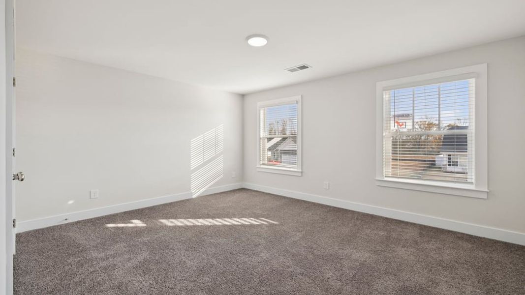 Representative unfurnished interior of a home built from the Phoenix by D.R. Horton in Edgewood Estates, Greenville (Image 18).