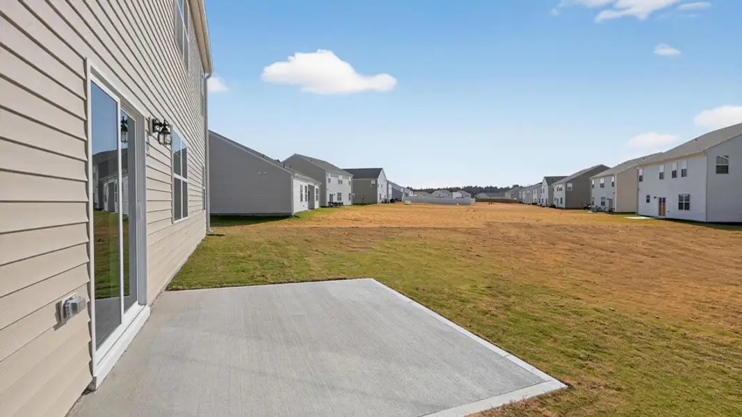 Exterior details and patio area of a home in North Gate, Vass (Image 4).