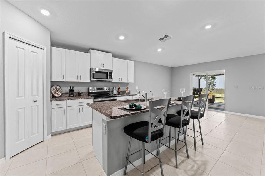 Furnished interior view inside a new home in Abbott Square: The Executives, Zephyrhills (Image 22).