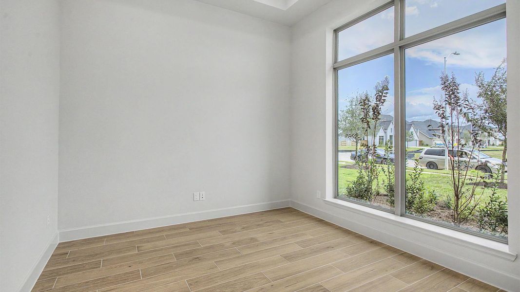 Spacious, unfurnished interior of a new home in Legacy Prairie at Katy Court, Katy (Image 5).
