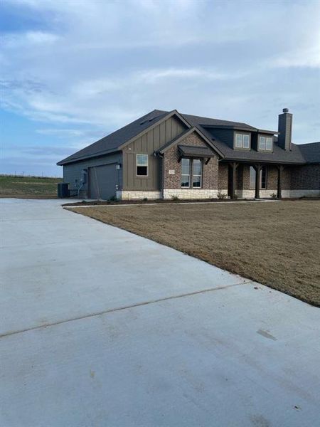 Front exterior of a new home in Hillview Addition, Decatur, TX, highlighting curb appeal (Image 14). Front exterior of a new home in Hillview Addition, Decatur, TX, highlighting curb appeal (Image 14).