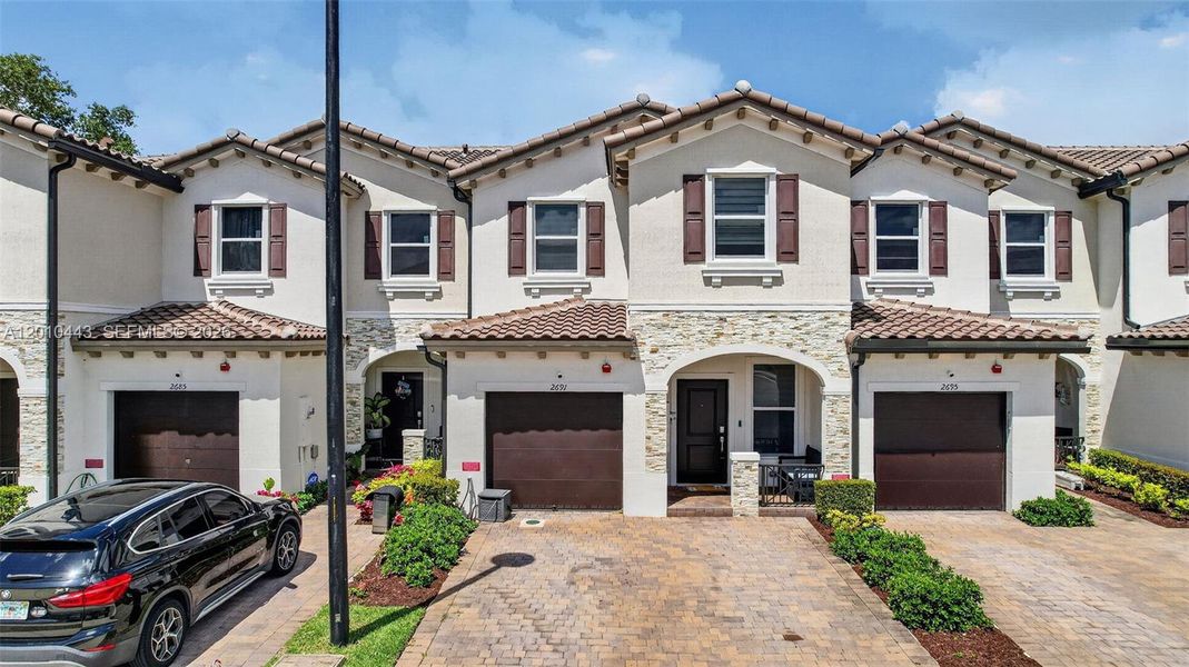 Front exterior of a new home in , Lauderhill, FL, highlighting curb appeal (Image 28).