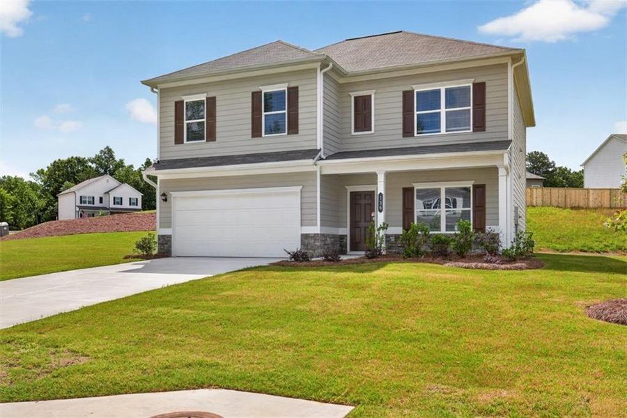 Front exterior of a new home in Jones Ridge, Dallas, GA, highlighting curb appeal (Image 26). Front exterior of a new home in Jones Ridge, Dallas, GA, highlighting curb appeal (Image 26).