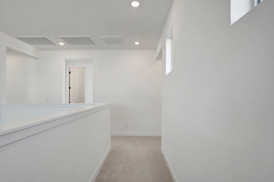 Spacious, unfurnished interior of a new home in Soleo, San Tan Valley (Image 22).
