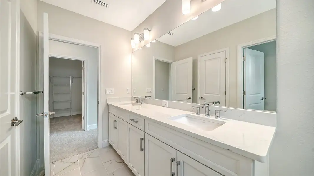 Furnished interior view inside a new home in Palm Grove, Lakewood Ranch (Image 4). Furnished interior view inside a new home in Palm Grove, Lakewood Ranch (Image 4).