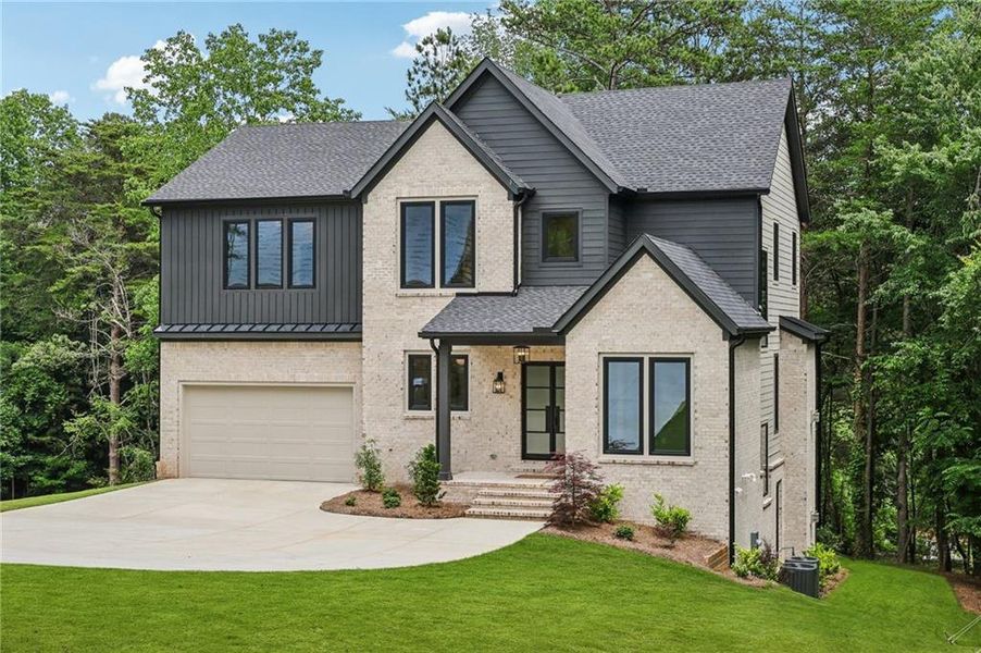 Front exterior of a new home in , Cumming, GA, highlighting curb appeal (Image 36).