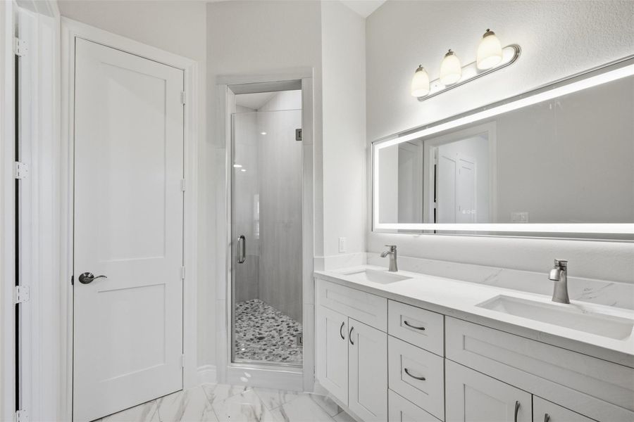 Master bath- Seperate standing shower & luxurious Vanity mirror