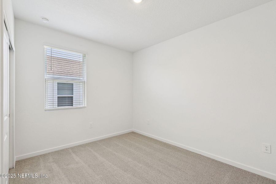 Spacious, unfurnished interior of a new home in Lakes at Bella Lago - Signature Series, Green Cove Springs (Image 28). Spacious, unfurnished interior of a new home in Lakes at Bella Lago - Signature Series, Green Cove Springs (Image 28).