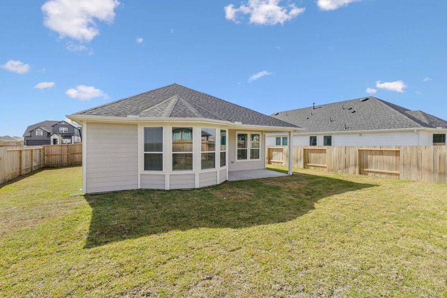 Exterior details and patio area of a home in Windcress, Cove (Image 4). Exterior details and patio area of a home in Windcress, Cove (Image 4).