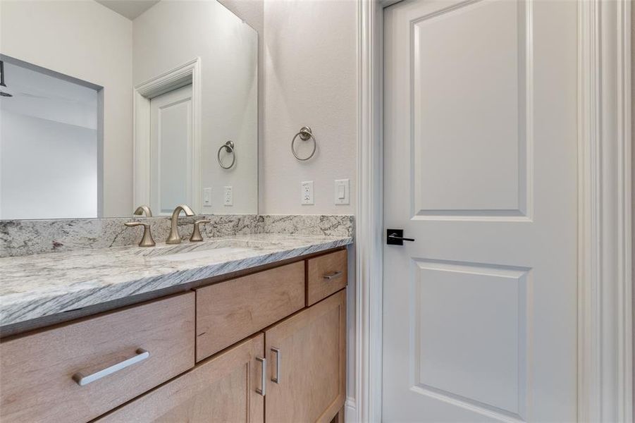 Bathroom featuring vanity Bathroom featuring vanity