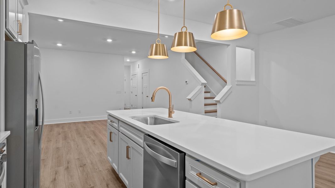 Accomplished layout with a stunning 9-foot island, pendant lighting, and superior craftsmanship Accomplished layout with a stunning 9-foot island, pendant lighting, and superior craftsmanship