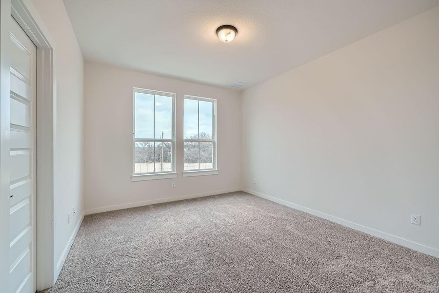 Spacious, unfurnished interior of a new home in Townhomes at Gattis, Round Rock (Image 23).