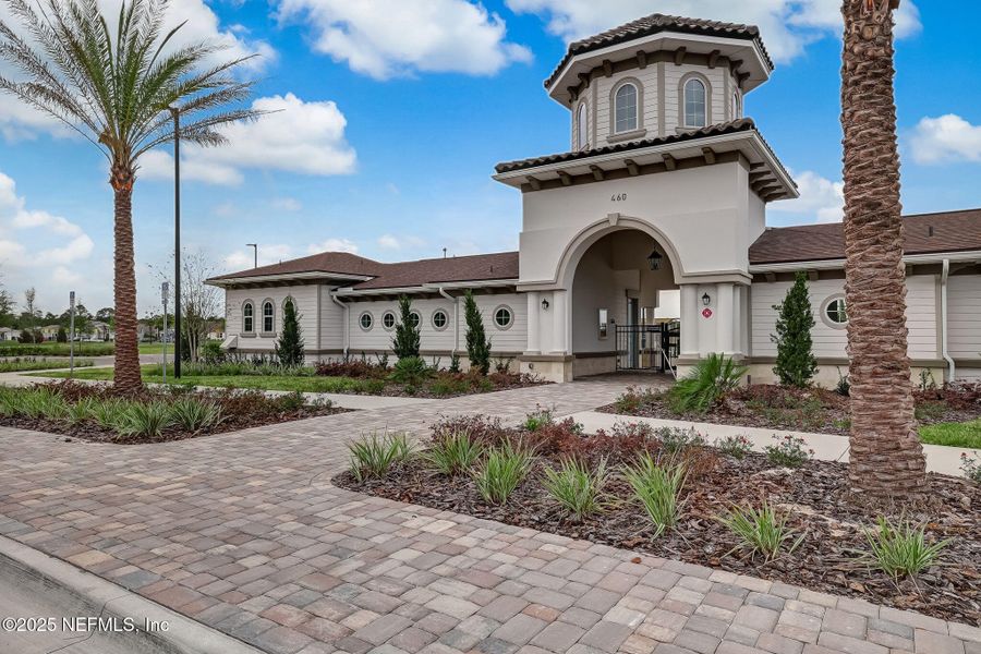 Front exterior of a new home in Dorado at Entrada, St. Augustine, FL, highlighting curb appeal (Image 22).