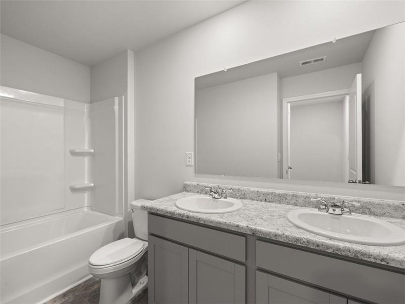 Furnished interior view inside a new home in Oaks at Cedar Grove, Fairburn (Image 10).