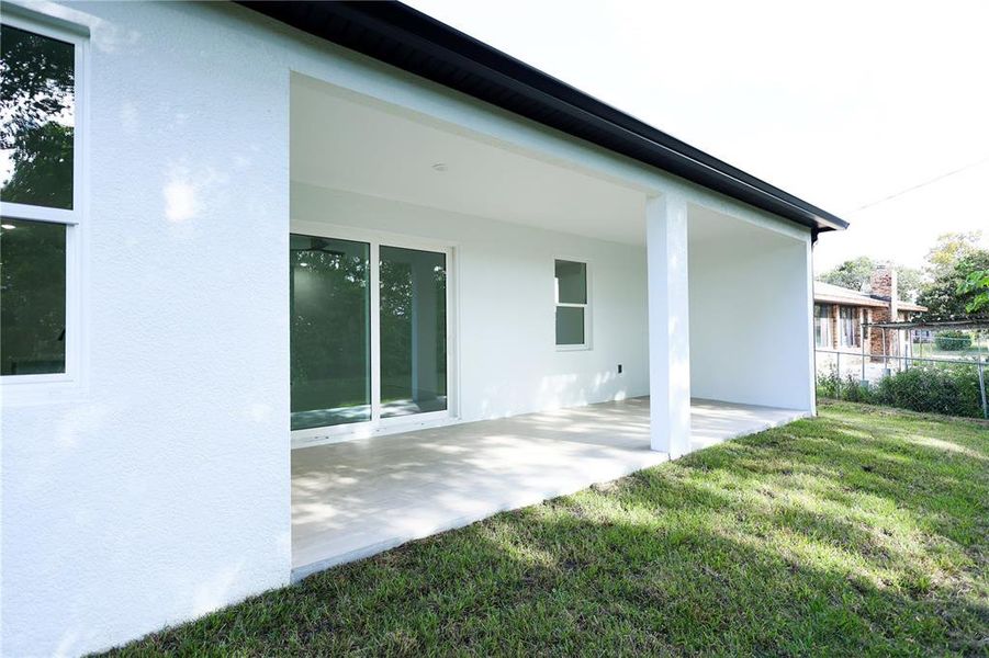Exterior details and patio area of a home in , Deltona (Image 2).