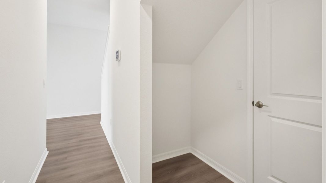 Furnished interior view inside a new home in Isla Mirada, San Antonio (Image 26).