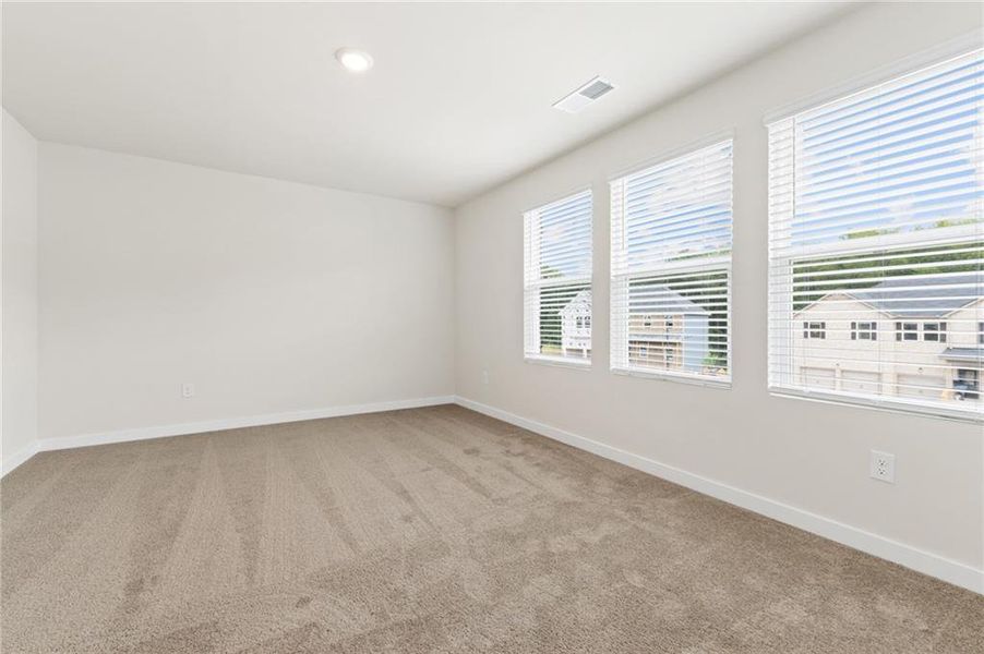 Spacious, unfurnished interior of a new home in Fern Dale, Fairburn (Image 19).