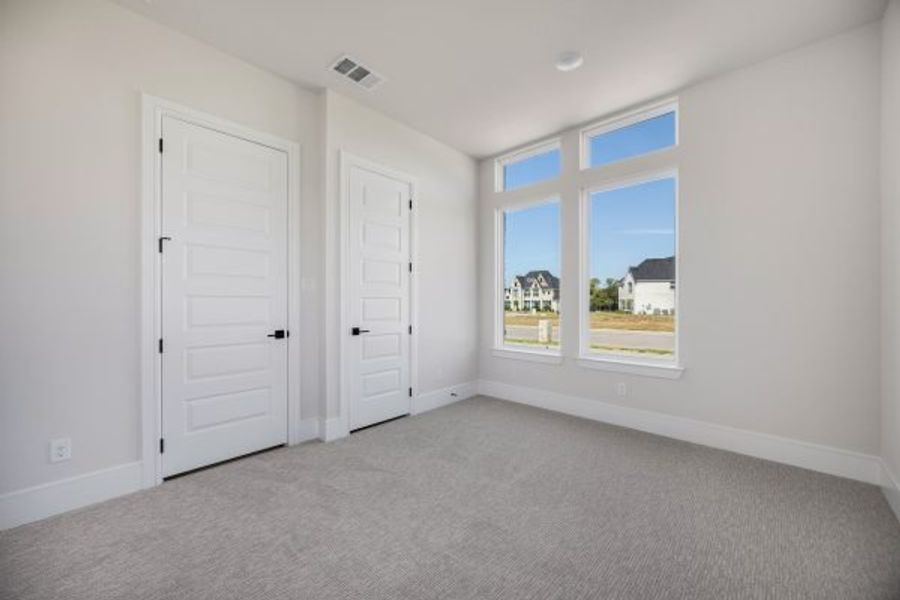 Spacious, unfurnished interior of a new home in Heath Golf and Yacht Club, Forney (Image 41).