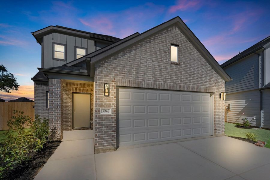 Front exterior of a new home in Grand Oaks Village, Houston, TX, highlighting curb appeal (Image 19). Front exterior of a new home in Grand Oaks Village, Houston, TX, highlighting curb appeal (Image 19).