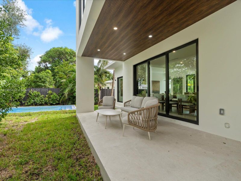 Exterior details and patio area of a home in , Miami (Image 2).