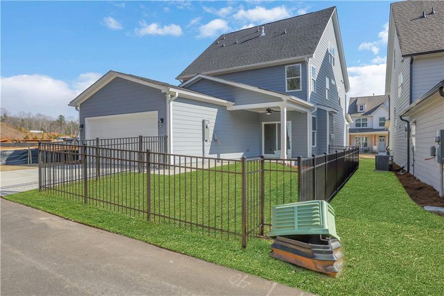 Exterior details and patio area of a home in Marble Tree, Ball Ground (Image 4).