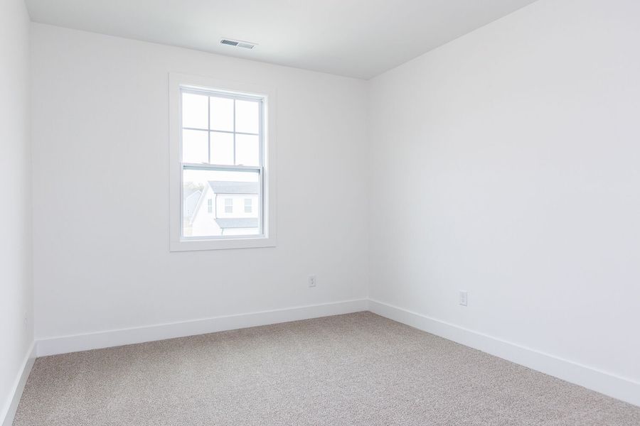 Spacious, unfurnished interior of a new home in High Grove Oaks, Fuquay Varina (Image 25).