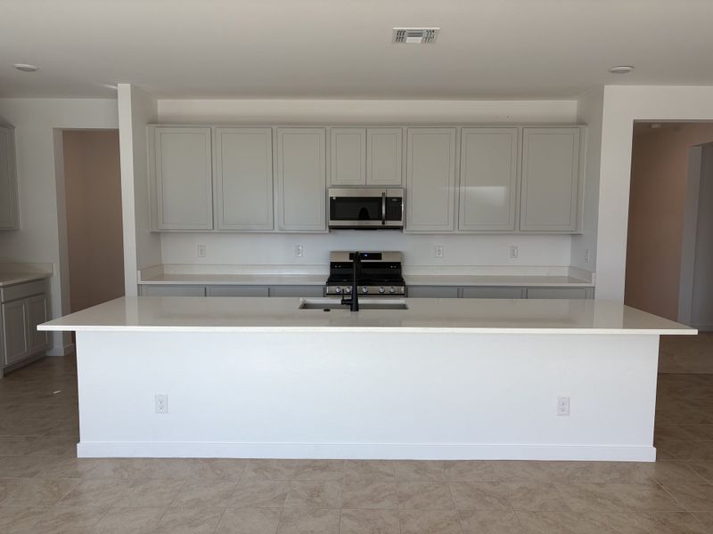 Furnished interior view inside a new home in Harvest at Citrus Park, Goodyear (Image 4).