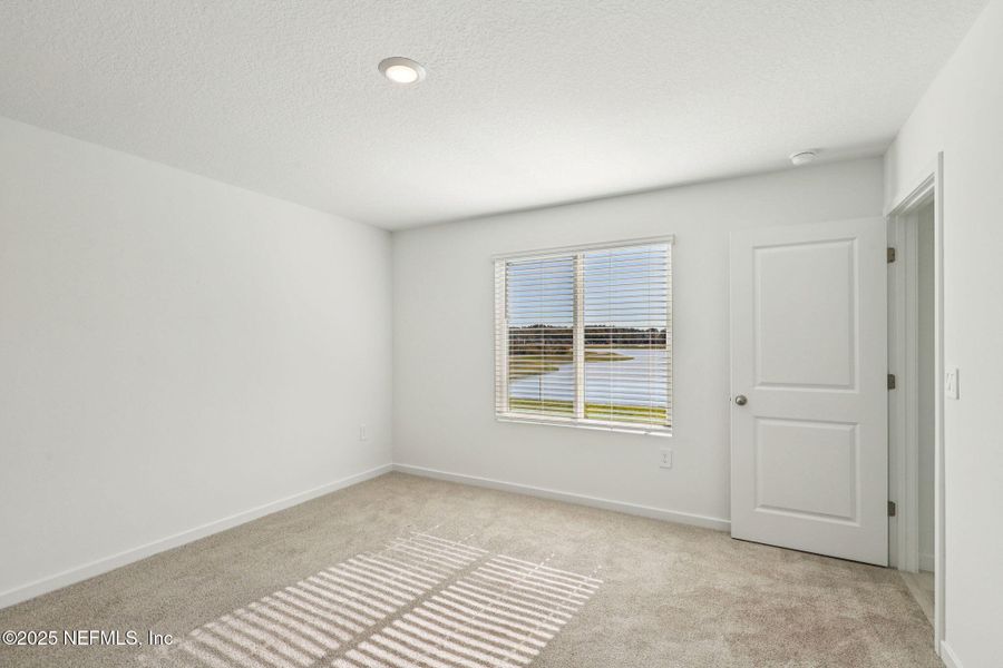 Spacious, unfurnished interior of a new home in Cypress Meadows - Signature Series, Jacksonville (Image 24).