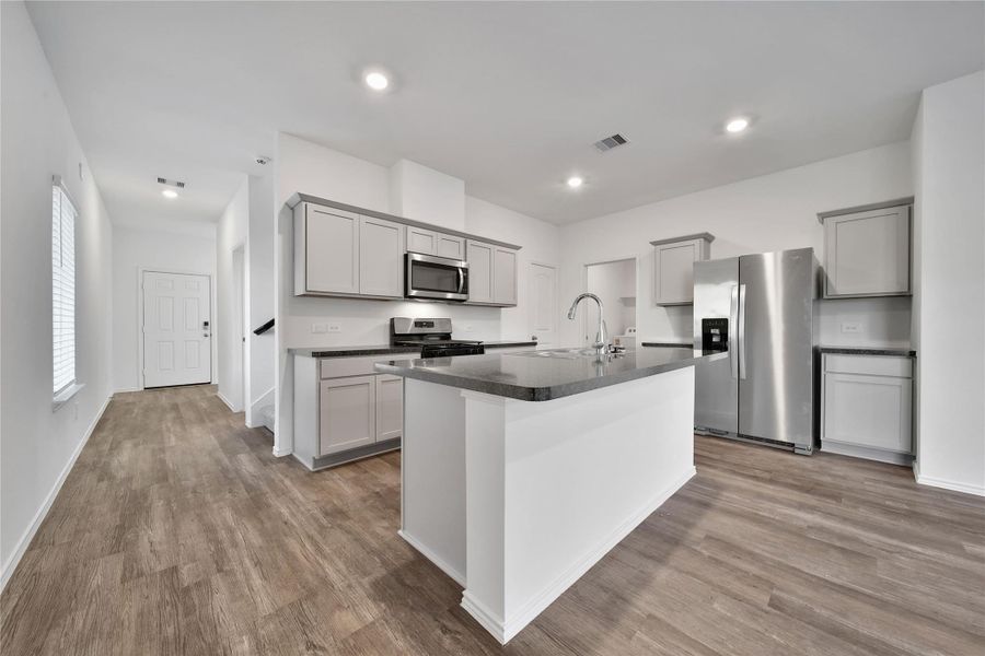 Furnished interior view inside a new home in Breckenridge Forest, Spring (Image 14).