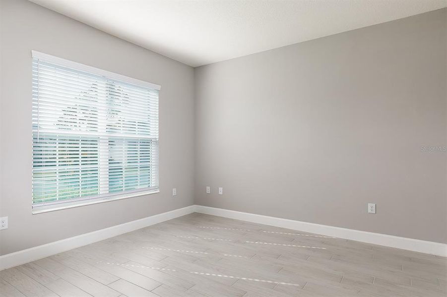 Spacious, unfurnished interior of a new home in Wolf Lake Ranch, Apopka (Image 22).