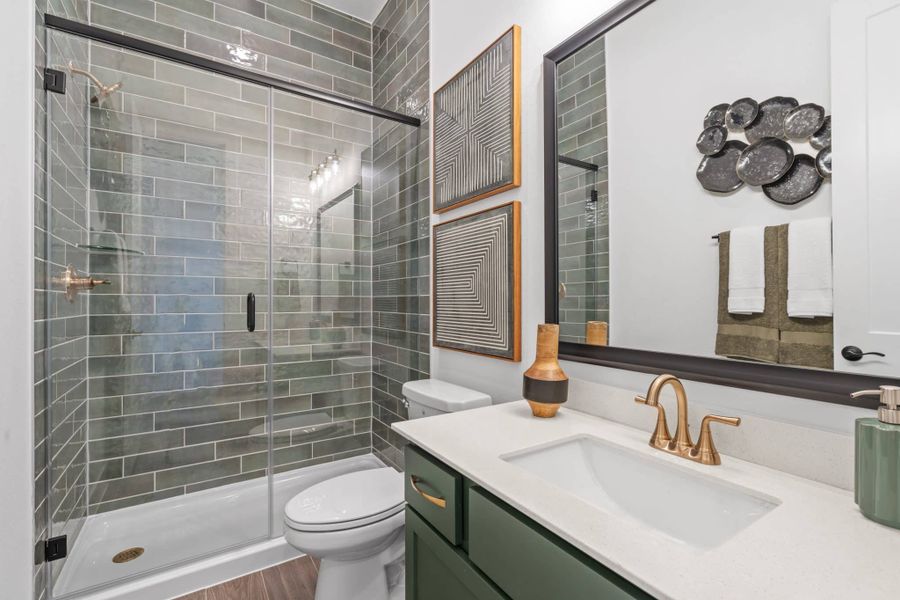 Representative furnished interior of a home built from the Aubrey by Chesmar Homes in Sienna, Missouri City (Image 36).