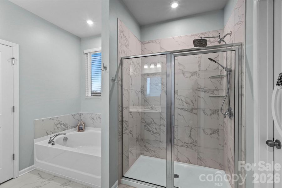 Large shower with rainfall showerhead, and soaker tub! Large shower with rainfall showerhead, and soaker tub!