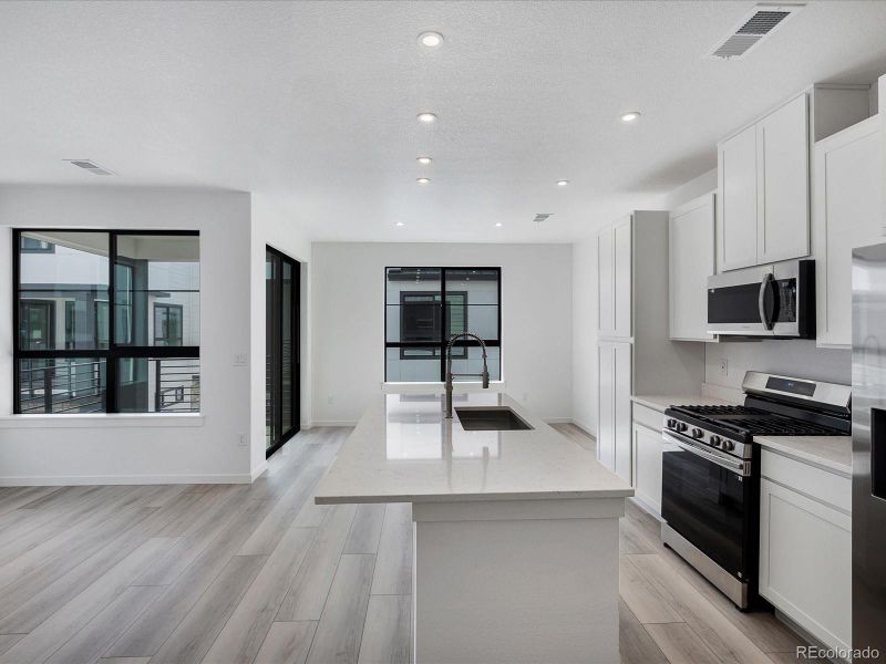 Furnished interior view inside a new home in The Hub at Virginia Village, Denver (Image 5). Furnished interior view inside a new home in The Hub at Virginia Village, Denver (Image 5).