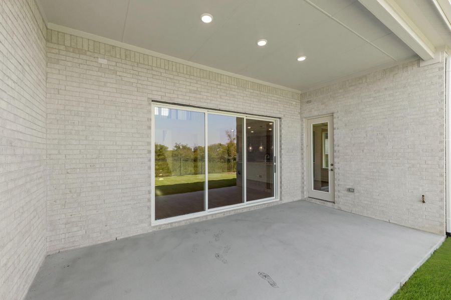 Exterior details and patio area of a home in Inspiration Collection at Union Park, Little Elm (Image 4). Exterior details and patio area of a home in Inspiration Collection at Union Park, Little Elm (Image 4).