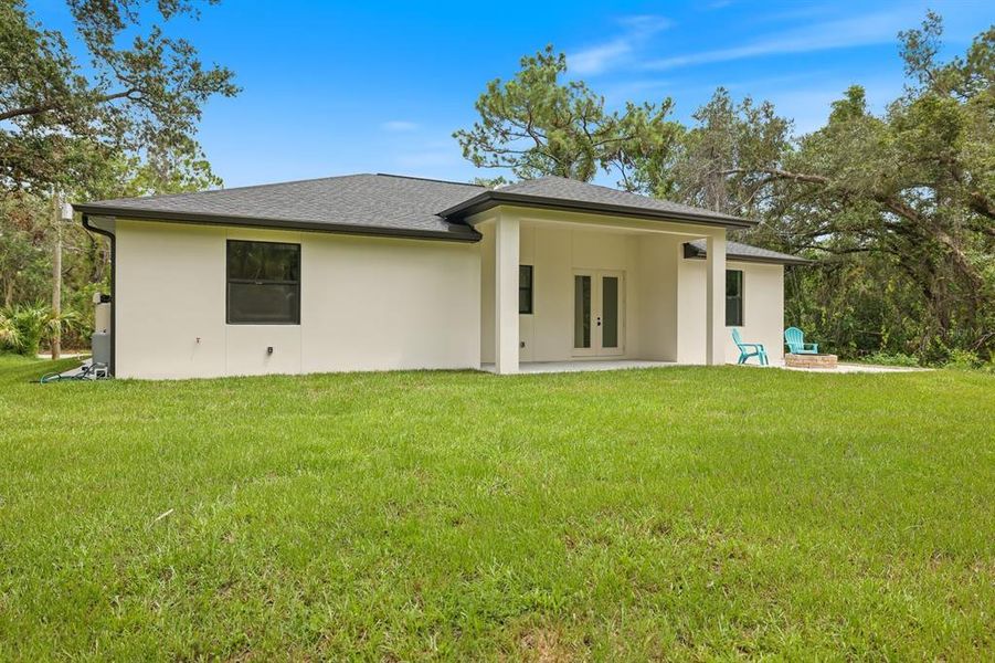 Exterior details and patio area of a home in , Port Charlotte (Image 24).