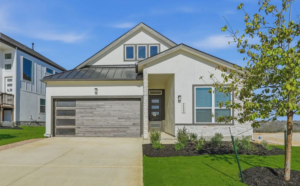 Representative exterior photo of a completed home built from the Talos by Chesmar Homes in Prominence Urban, San Antonio, TX (Image 18).