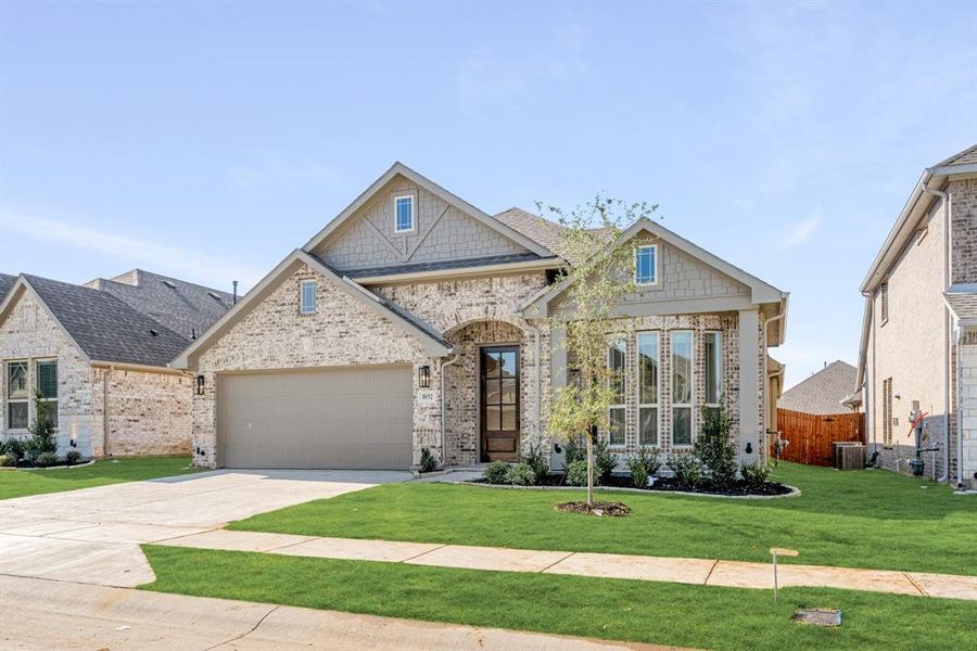 Front exterior of a new home in Eagle Glen 50, Alvarado, TX, highlighting curb appeal (Image 1). Front exterior of a new home in Eagle Glen 50, Alvarado, TX, highlighting curb appeal (Image 1).