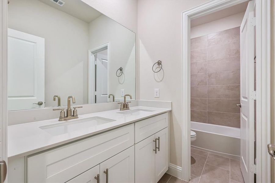 Furnished interior view inside a new home in Symmetry 37s, Frisco (Image 18).