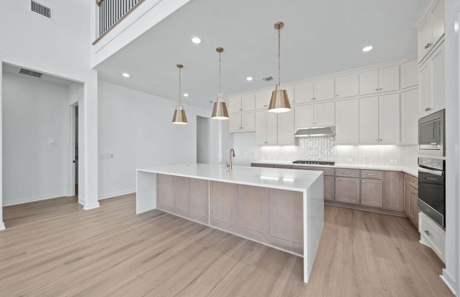 Furnished interior view inside a new home in 6 Creeks, Kyle (Image 7).