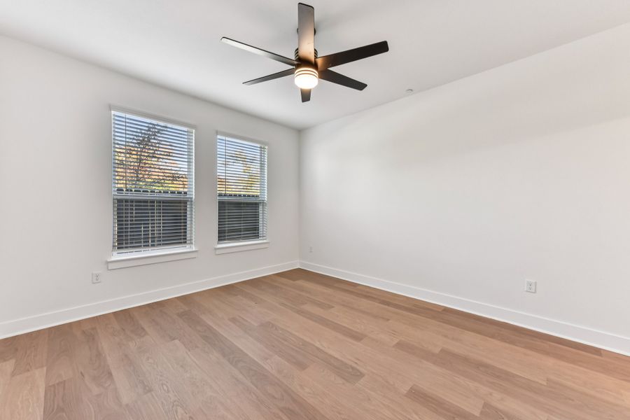 Spacious, unfurnished interior of a new home in Koenig Townhomes, Austin (Image 22).