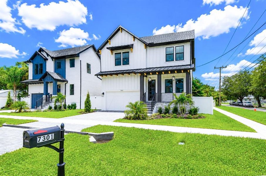 Front exterior of a new home in , Tampa, FL, highlighting curb appeal (Image 26).