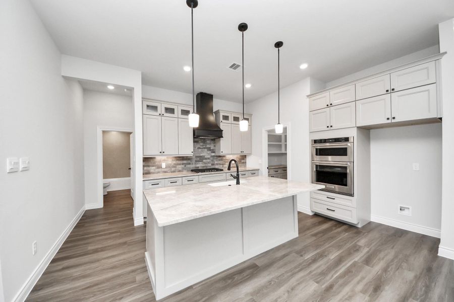 Furnished interior view inside a new home in Lexington Heights, Willis (Image 7).