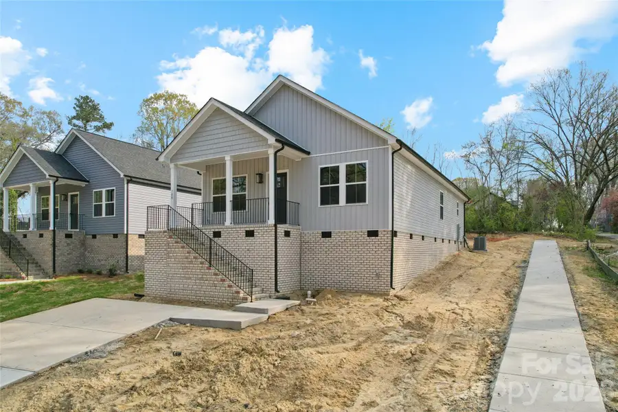 Exterior details and patio area of a home in , Spencer (Image 2). Exterior details and patio area of a home in , Spencer (Image 2).