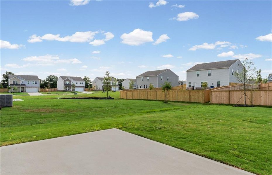 Exterior details and patio area of a home in Anderson Point, McDonough (Image 3).